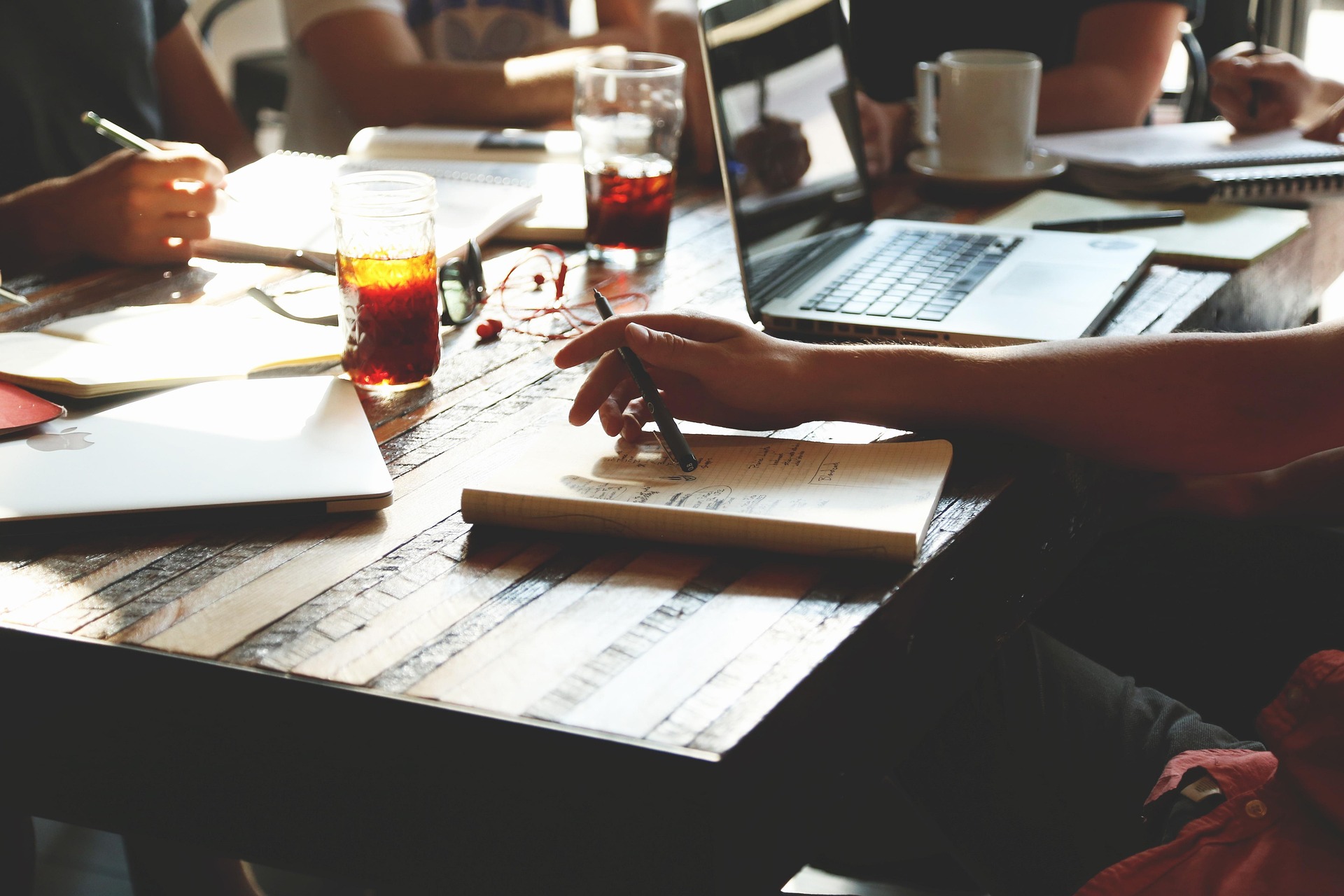 Photo of writers at a table.